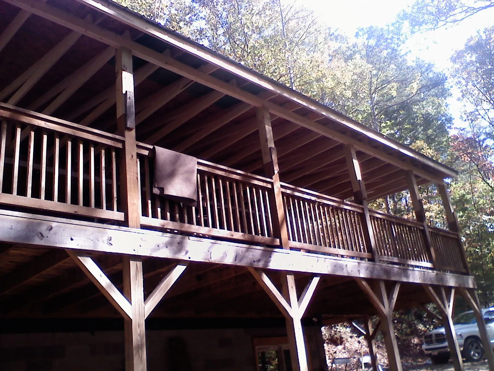 Timber framing under a new elevated porch and deck — Roof Leak Repair in Evergreen by Roofing Brothers